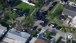 Stolen car chase ends in guns-drawn standoff after crash involving two police cruisers