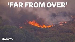 Watch as firefighters continue to battle devastating wildfires across Britain