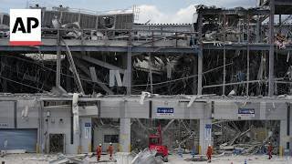 Search on for survivors in Aeon mall after second floor collapsed in Japan earthquake
