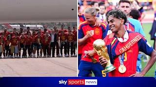 World Cup winners Spain touch down in Madrid as heroes!
