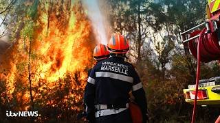 Thousands of firefighters tackle European wildfires in blistering heat in 'David v Goliath' battle