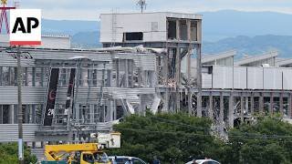 Rescuers search for survivors in destroyed Aeon mall in Japan after earthquake