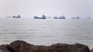 Tanker attacked in Strait of Hormuz as US strikes Iran for tenth consecutive night