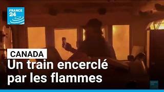 Canada : les images impressionnantes d’un train encerclé par les flammes • FRANCE 24