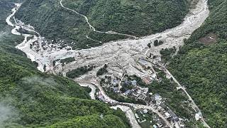 10 killed and nearly two dozen injured after flash floods hit tourist site in northwestern China