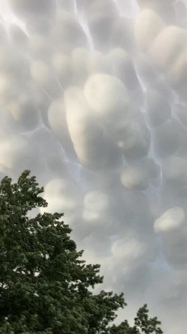 Mammatus clouds form in the sky above Newton, Kansas