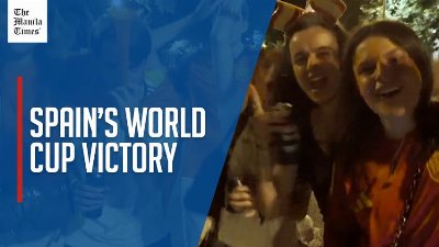 Fans cheer, sound car horns after Spain's World Cup victory