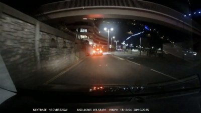 Moment man throws victim over 12ft wall onto busy road caught on dashcam