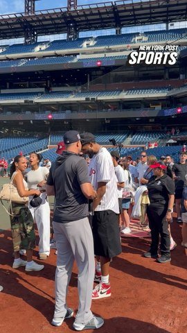 Aaron Boone catches up with NBA Champion Mikal Bridges before the game