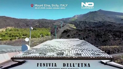 Drone footage shows Mount Etna cable car above volcanic landscape