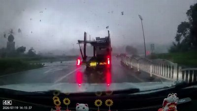 Tornado picks up car and flings it across road in dramatic video